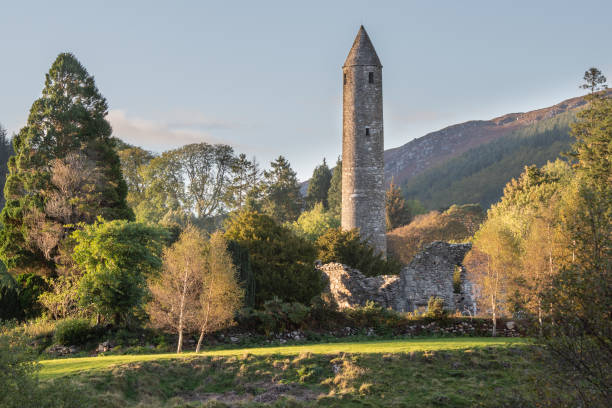 istock Glendalough Round tower, built of mica-slate interspersed with granite . 1368971253