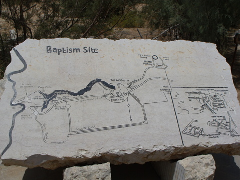 Bethany, Jordan, August 9, 2010: Map on a stone of the place of the baptism of Jesus Christ in Bethany along the Jordan River. Jordan