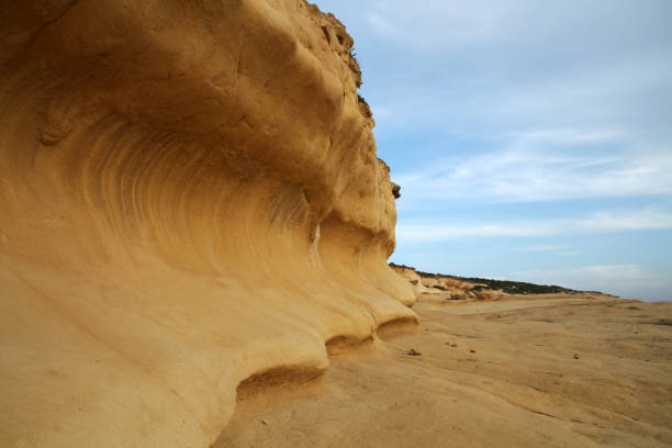 istock Eroded limestone cliffs of Xlendi, Gozo, Malta 1368975291