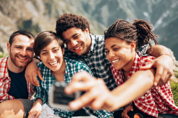 istock friends take a selfie during the hike 1368975334