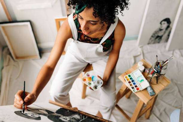 istock Top view of a young painter working on a new project 1368975357