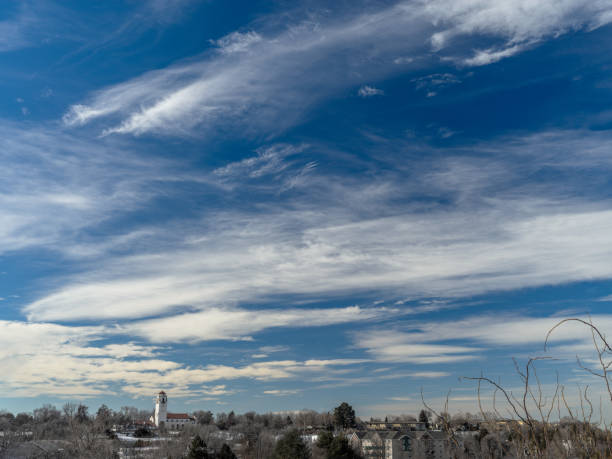 a water reservoir against a background of blue sky and clouds