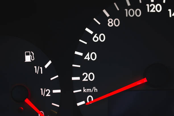 istock Black dial of car instruments with white arrows 1368976019