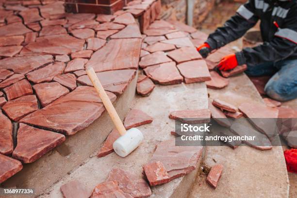 Stone Mosaic For Facing The Terrace Of The House Stock Photo - Download Image Now - Mason - Craftsperson, Stone Material, Installing