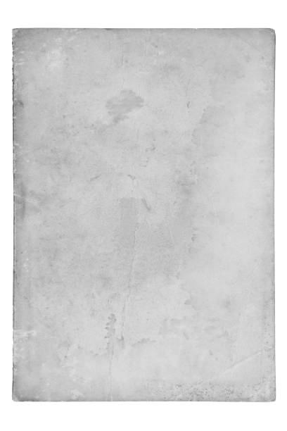 istock Very old grunge kraft gray paper with stains on white isolated background 1368978583