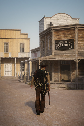3D illustration of a cowboy or gunman walking towards a saloon with a rifle in his hand in an old wild west town.