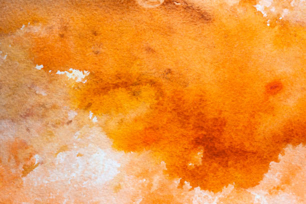 istock Bright orange hand painted watercolor background texture. 1368980674