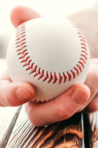 istock Baseball in hand - souvenir from the stadium 1368983180