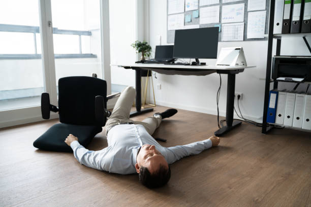 istock Faint Accident In Office. Fall From Chair 1368983696