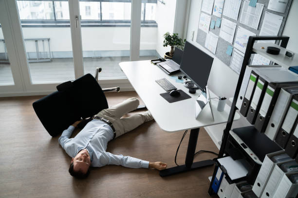 istock Faint Accident In Office. Fall From Chair 1368983711