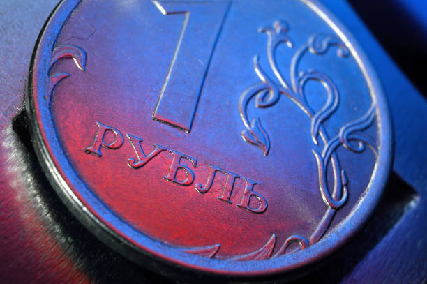 a Russian one ruble coin lies on a metal surface. close-up