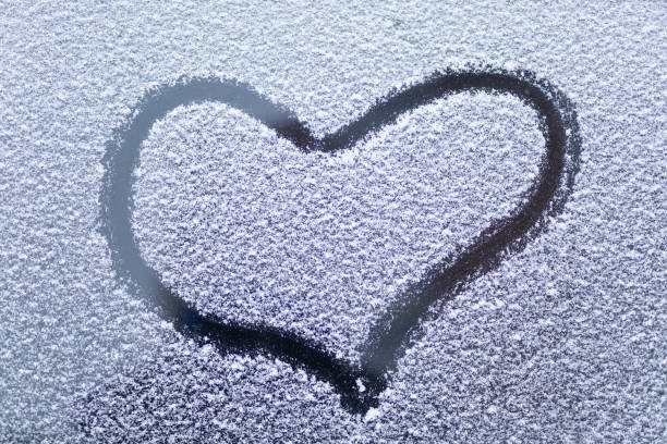 istock A heart drawn in the snow. 1368988594
