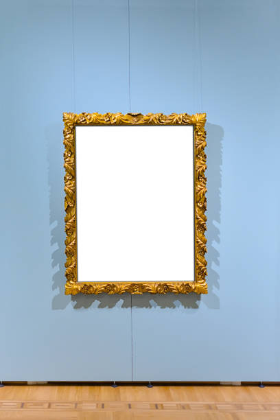 istock Retro old golden frame hanging in the galery 1368992072