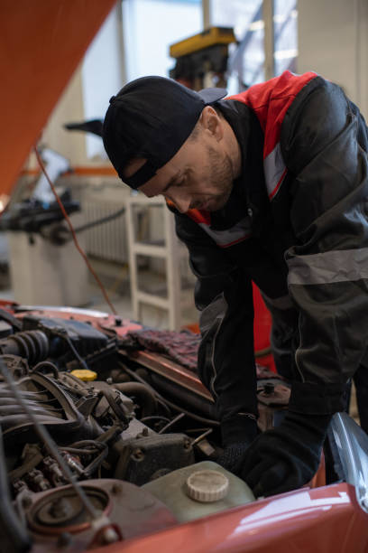 istock Vertical Portrait of Car Mechanic 1368992073