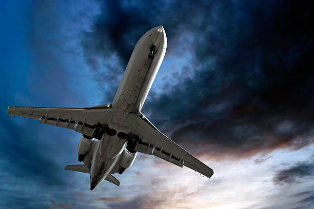 istock corporate jet airplane landing at dusk 136899455