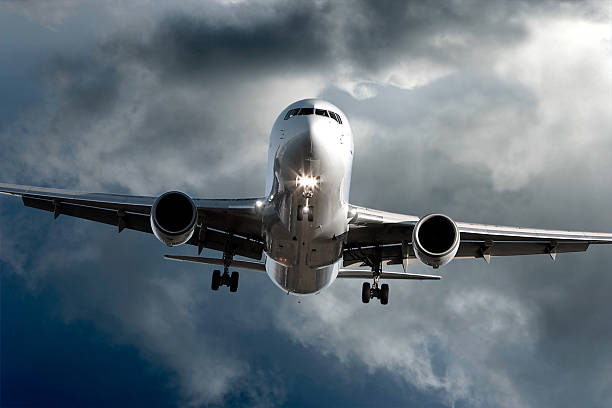 istock jet airplane landing in storm 136899533