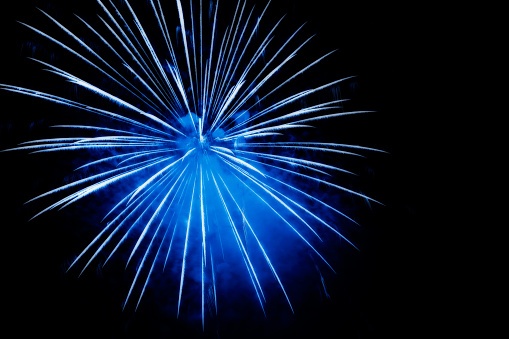 blue fireworks explosion in close-up