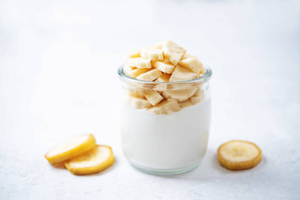 istock Greek yogurt banana parfait in a jar 1368997138