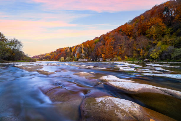 istock River rapids with autumn forests on banks 1368999716