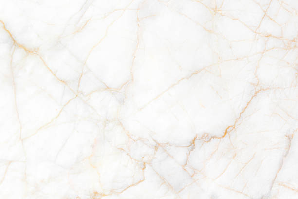 White and gold marble texture background. Used in design for skin tile ,wallpaper, interiors backdrop. Natural patterns. Picture high resolution. Luxurious background stock photo