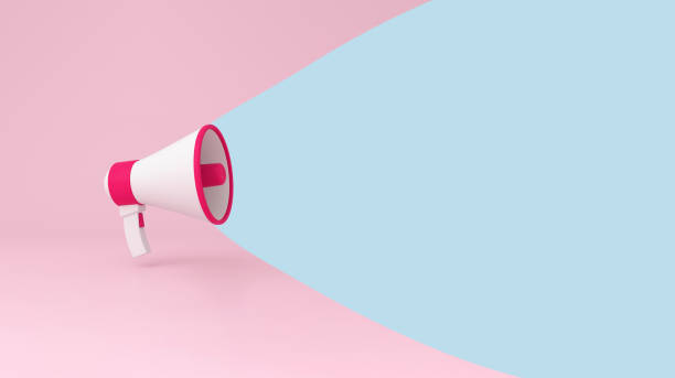 istock Megaphone Announcement on Pink Background with copy space on blue. 1369007881