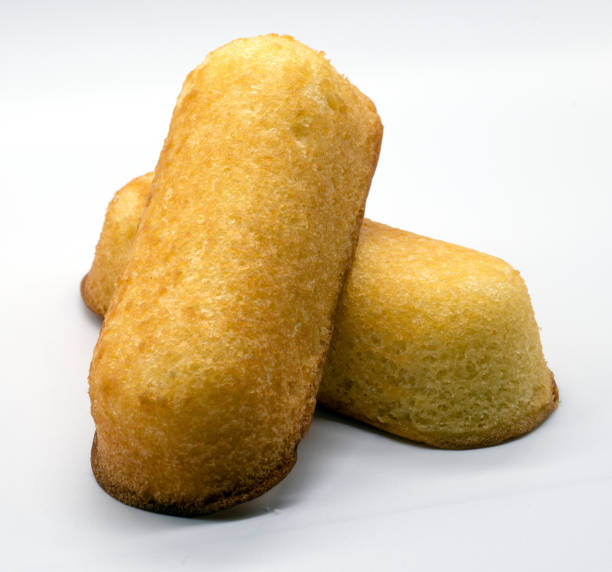 istock Baked cake twinkie against white background 1369008735