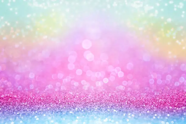 Photo of Rainbow color glitter girly birthday party unicorn background