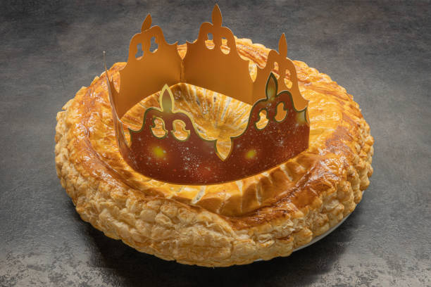 istock Paris, France - 02 04 2022: Preparation of a chocolate King cake 1369009382