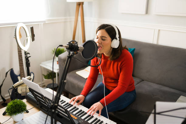 istock Passionate musician playing the keyboard 1369009532