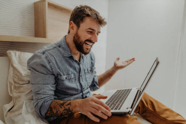 istock Young man in the bedroom 1369010689