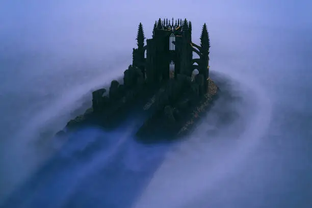 Ruined historic church in mist. High angle view. 3D render.