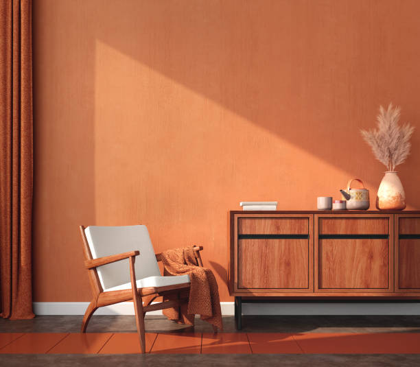 istock Orange room with chair,table,pampas and orange wall background.3d rendering 1369012075