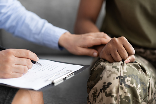 Closeup Shot Of Psychotherapist Supporting African American Soldier Woman During Therapy Session In Office, Unrecognizable Psychologist Lady Comforting Black Military Female In Uniform, Cropped