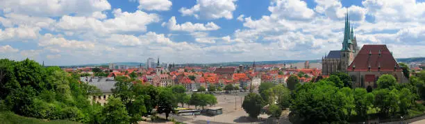 Cityscape Of Erfurt Germany With The Famous Cathedral On The Right On A Beautiful Sunny Summer Day With A Clear Blue Sky And A Few Clouds