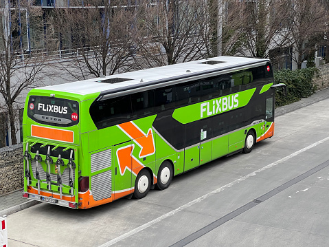 Munich, Bavaria Germany - Febuary 9 2022: Parked FlixBus German unicorn bus service startup global logo.