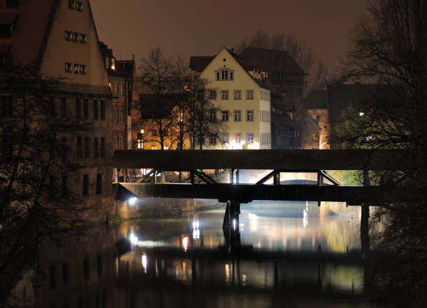 Historic Covered Timber Bridge Henkersteg In Nuremberg At Night Germany
