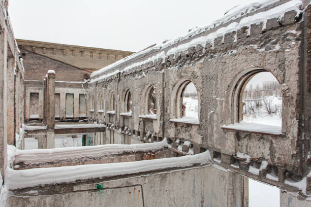 istock Old railway station at winter with painted walls 1369015929
