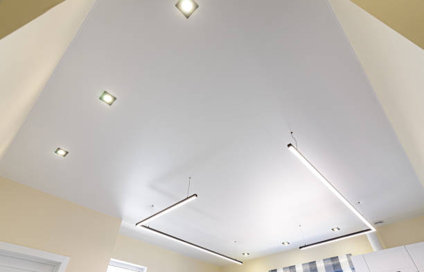 istock Modern white matte stretch ceiling with zoned lighting 1369019974