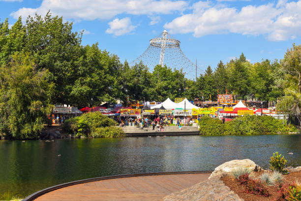 the annual pig out in the park festival with food booths, attractions and concerts, at riverfront park on the spokane river in spokane washington. - rio carnival imagens e fotografias de stock