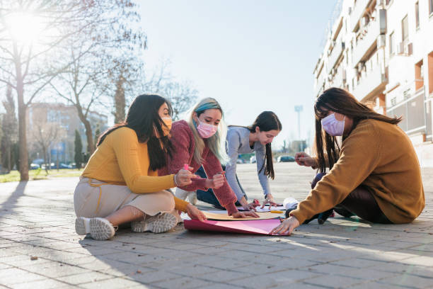 istock Multicultural group preparing together feminist movement womens international day 8m 1369023045