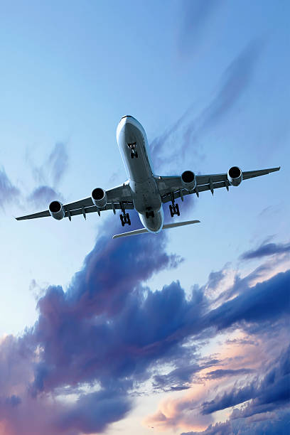 istock XXL jet airplane landing at dusk 136902438