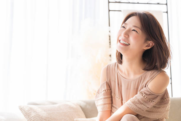 istock attractive asian woman relaxing 1369031111