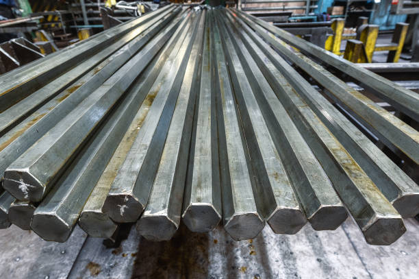 istock Bundle of hexagonal metal rods, hot rolled steel 1369032070
