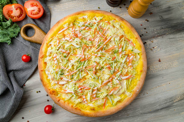 istock Pizza with vegetables vegetarian on grey wooden table top view 1369032758