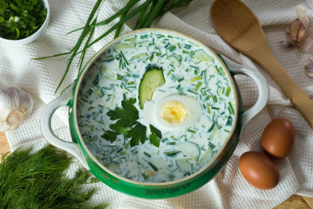 Okroshka on kefir. Traditional East Slavic cold vegetable soup with kefir and boiled egg. stock photo