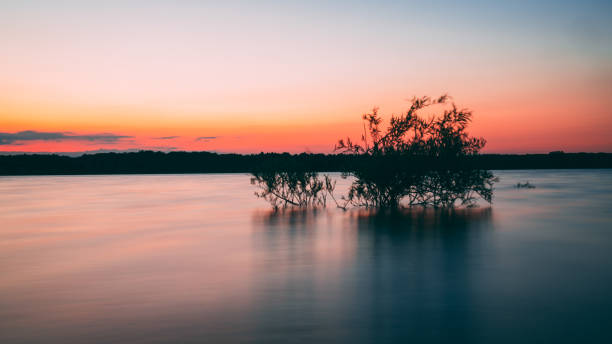istock Long exposure sunset photos at a lake 1369039275