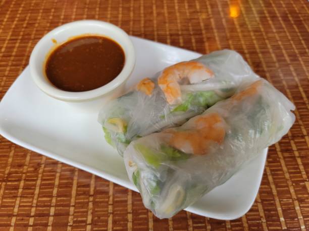 istock fresh Vietnamese salad rolls with shrimp and sauce 1369039283