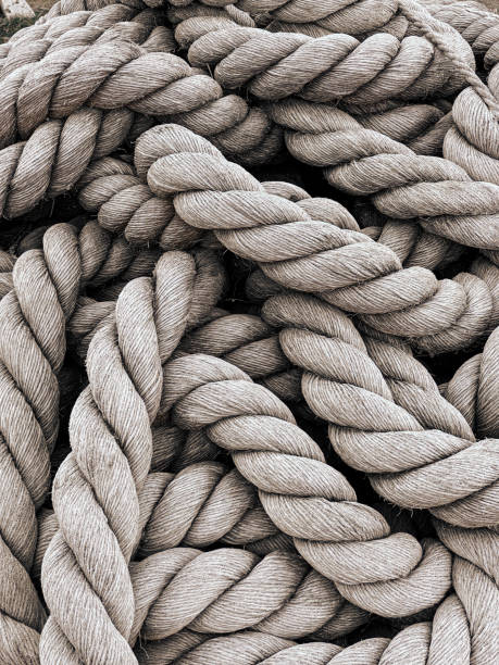 istock Rope - Pile of thick rustic rope. Top view. 1369043360