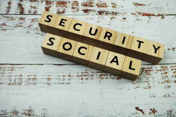 istock Social Security Word alphabet letters on wooden background 1369046208