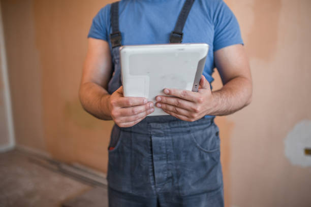 istock Close-up of painter holding tablet 1369051838